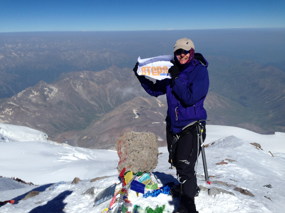 Cheryl on the summit of Mount Elbrus last year